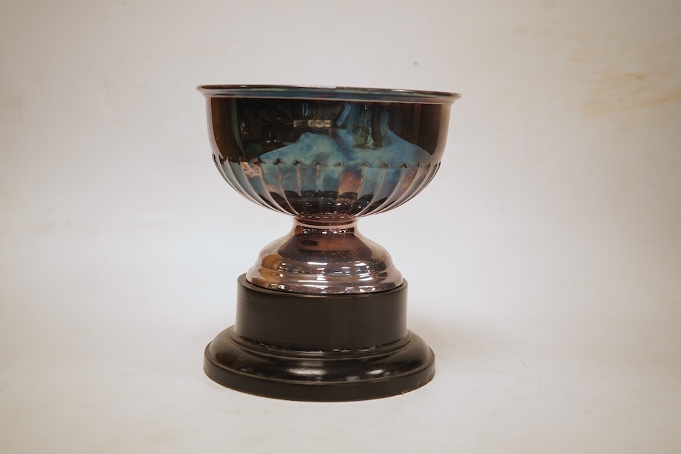 A George VI demi-fluted silver rose bowl, by Walker & Hall, Sheffield, 1939, diameter 14.4cm, 7.2oz, on an ebonised socle.
